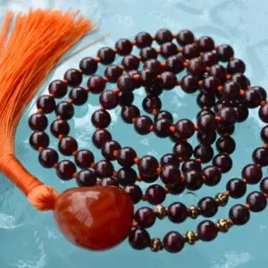 Knotted Garnet Stone Beads Mala Necklace designed for Root and Sacral Chakra support, resonating with Capricorn and Aquarius, enhancing vitality, creativity, and emotional balance.