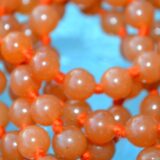 Orange Jade | Sacral Chakra Mala Necklace with Carnelian and Moonstone beads, designed for Sacral Chakra balance, Cancer & Leo energies, and enhanced creativity and emotional balance.