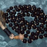   Black Tourmaline Knotted Mala Necklace featuring genuine Black Tourmaline beads, designed for protection and transforming negative energy into positive energy