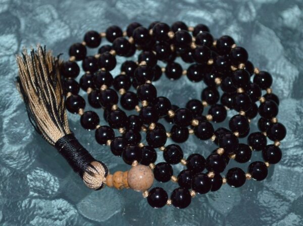   Black Tourmaline Knotted Mala Necklace featuring genuine Black Tourmaline beads, designed for protection and transforming negative energy into positive energy