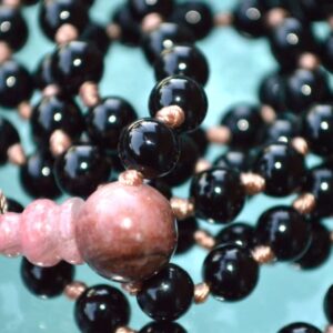 Natural Black Tourmaline Mala Necklace designed to activate the Root Chakra, providing protection and grounding, ideal for Capricorn and Libra, made with high-quality Black Tourmaline beads.