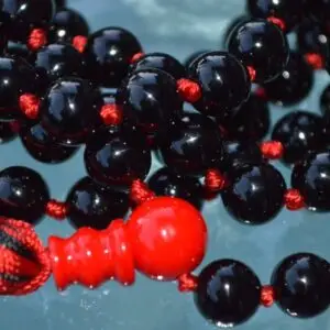 Black Tourmaline Mala Necklace designed for Root Chakra healing, perfect for Capricorn and Libra, offering protection and grounding.