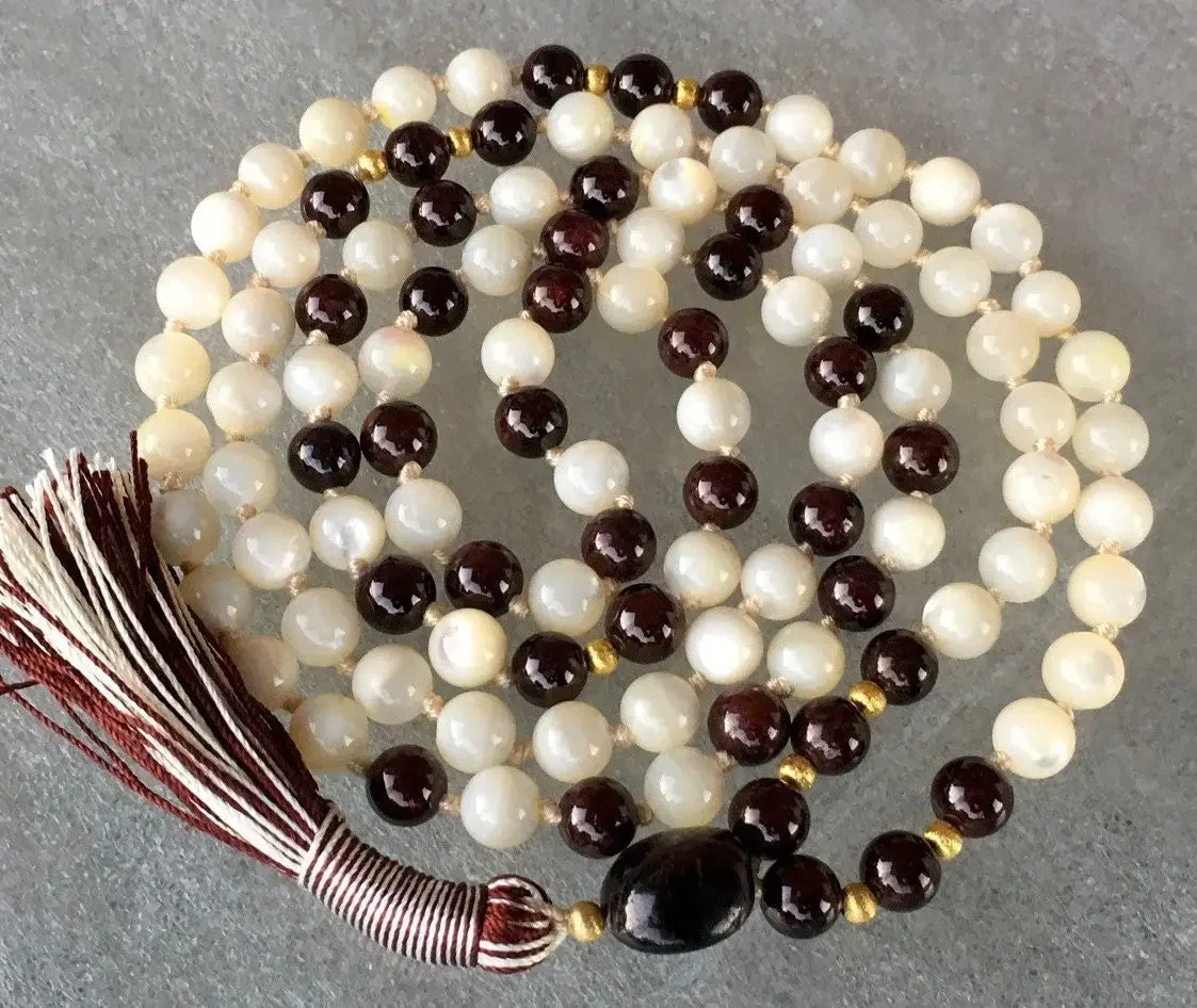  Mother of Pearl & Garnet Mala Necklace featuring genuine mother of pearl and garnet beads, designed for Sacral & Root Chakra balance, Capricorn & Aquarius empowerment, and enhanced emotional healing.