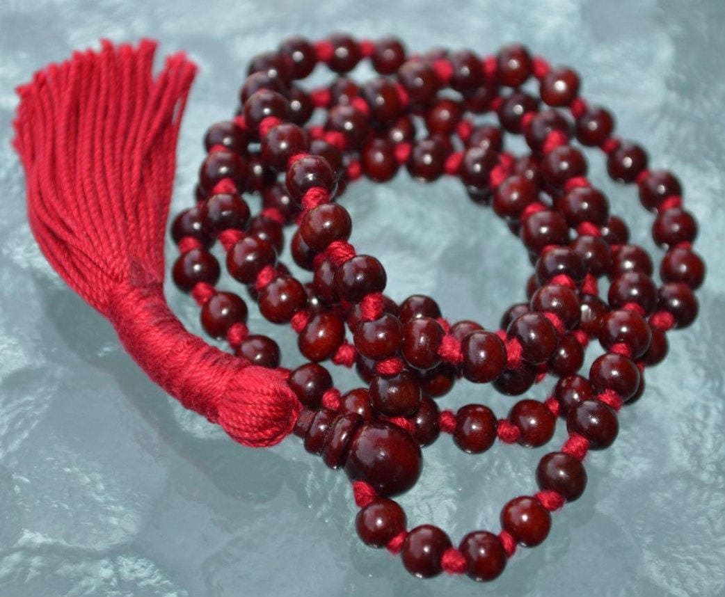 Hand Knotted Dainty Rosewood Mala Necklace designed for Root Chakra support, enhancing grounding and stability, with beads resonating with Taurus and Virgo.