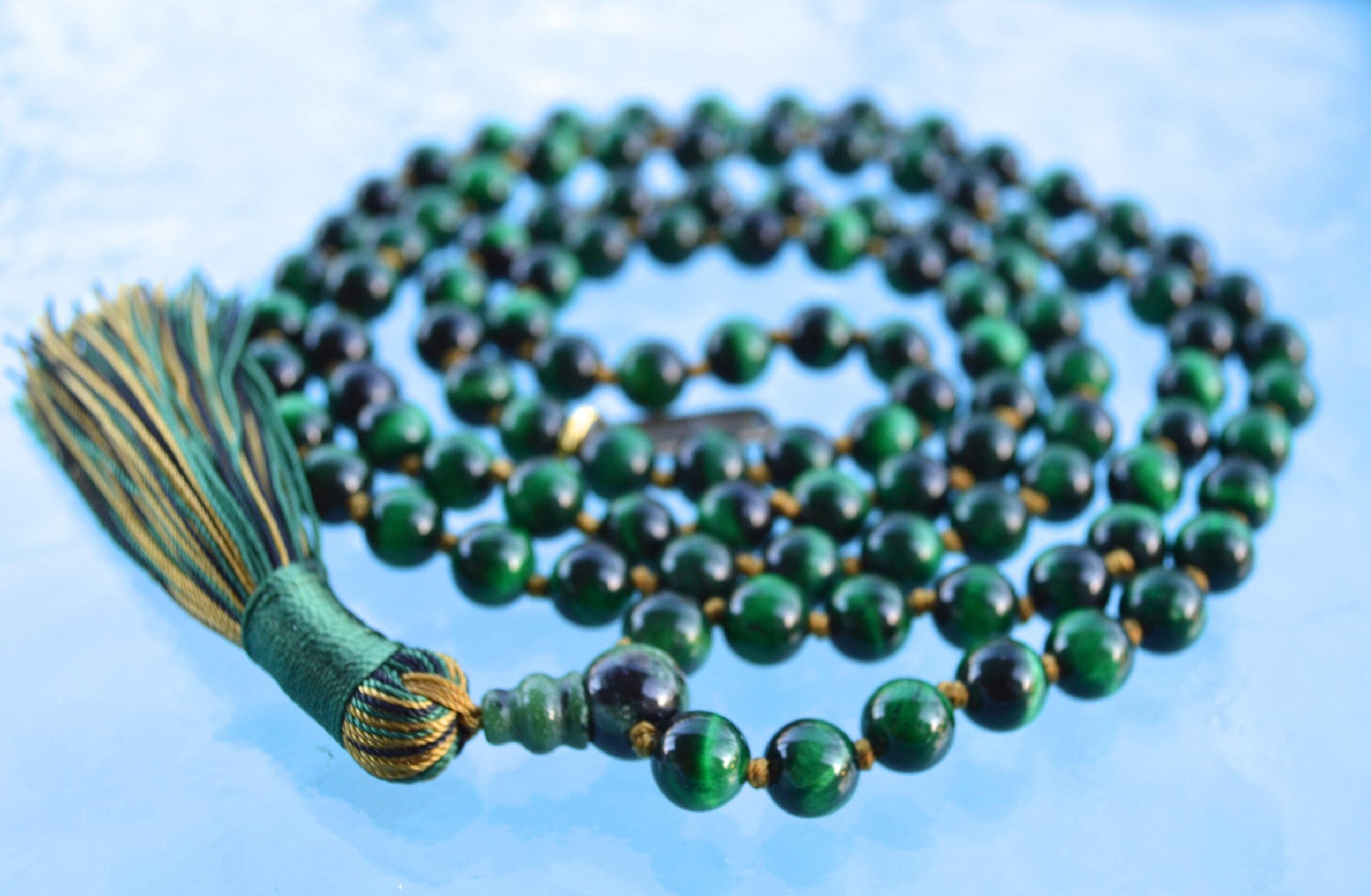 Green Tiger Eye Mala Necklace with natural Green Tiger Eye beads designed to support the Heart Chakra, promoting emotional balance and harmony, especially beneficial for Taurus and Virgo zodiac signs.