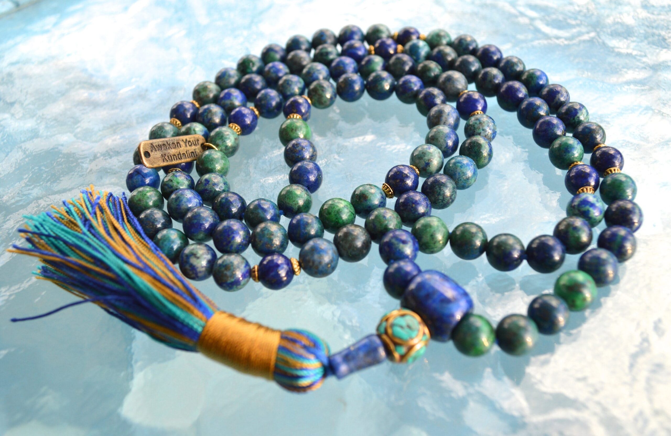 Azurite Mala Necklace featuring 108 hand-knotted beads, designed to support the Third Eye and Throat Chakras. Ideal for Aquarius and Sagittarius, it enhances intuition, clear communication, and spiritual growth.