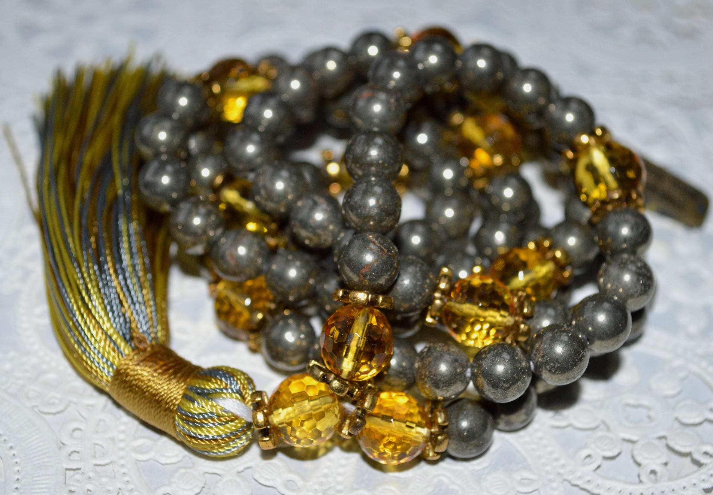 Golden Citrine & Pyrite Mala Beads Necklace designed for Solar Plexus and Root Chakra activation, promoting prosperity, protection, and grounding, resonating with Leo and Capricorn for confidence and stability.