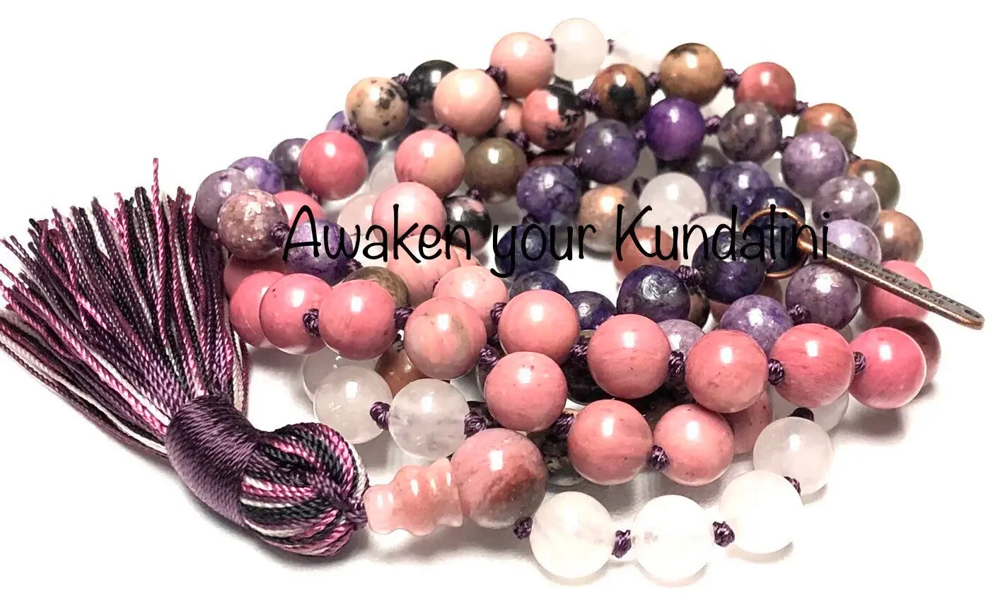 A Heart Chakra Mala Necklace featuring Rose Quartz, Rhodonite, Lepidolite, and Charoite beads, designed for emotional healing, self-love, and inner peace.