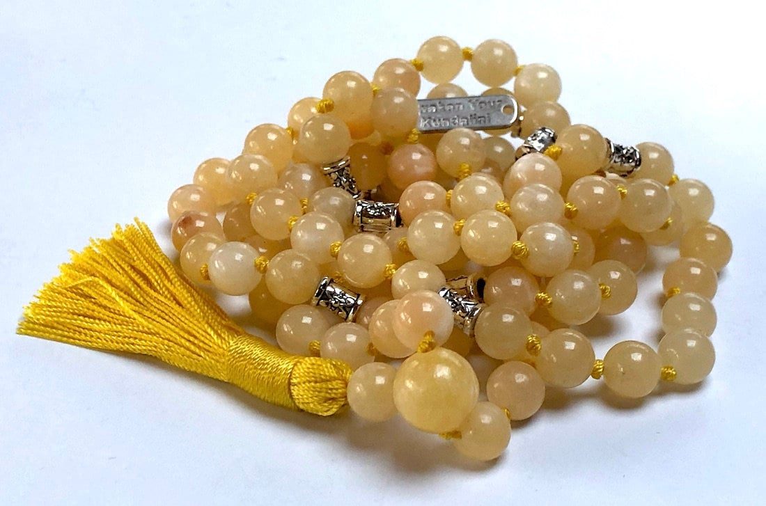 Yellow Calcite Mala Necklace with genuine Yellow Calcite beads, designed to enhance confidence and creativity. Supports Solar Plexus and Sacral Chakras, ideal for Leo and Cancer, perfect for meditation and personal growth.