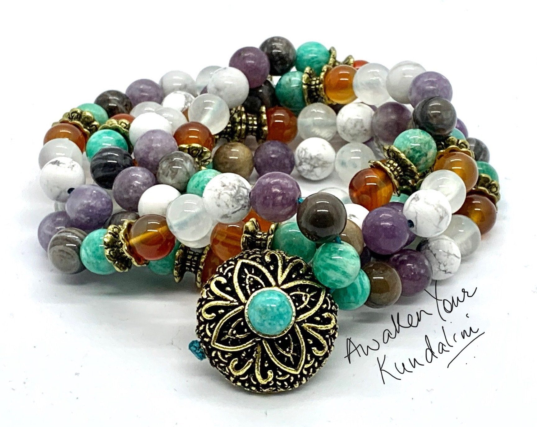 Crystal Healing Mala Necklace with 108 hand-knotted beads made of petrified wood, selenite, amazonite, and lepidolite, designed for grounding, emotional balance, and spiritual growth.