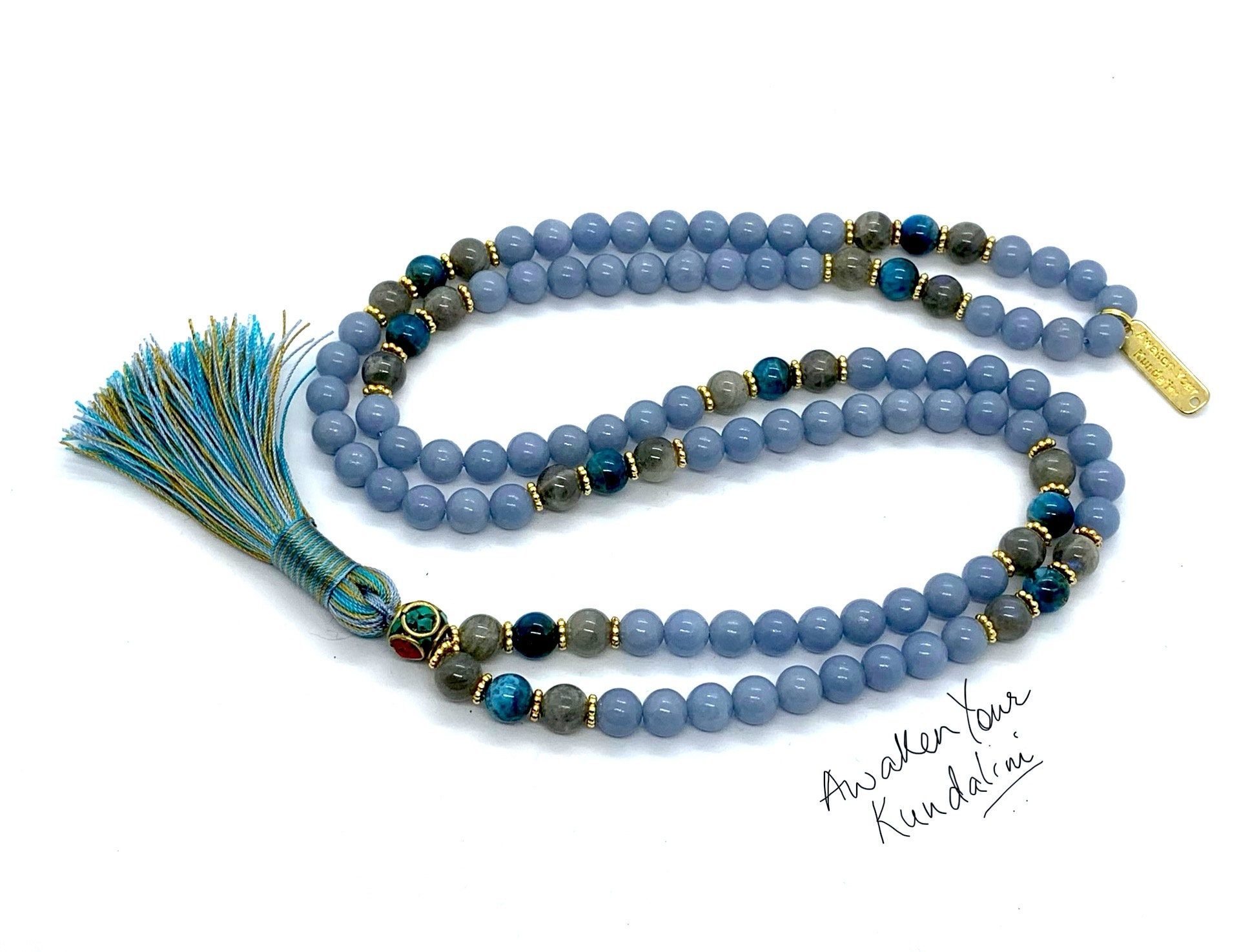 Celestial Angelite & Labradorite Mala Necklace with 108 hand-knotted beads, designed for communication and transformation, featuring a unifying tassel.