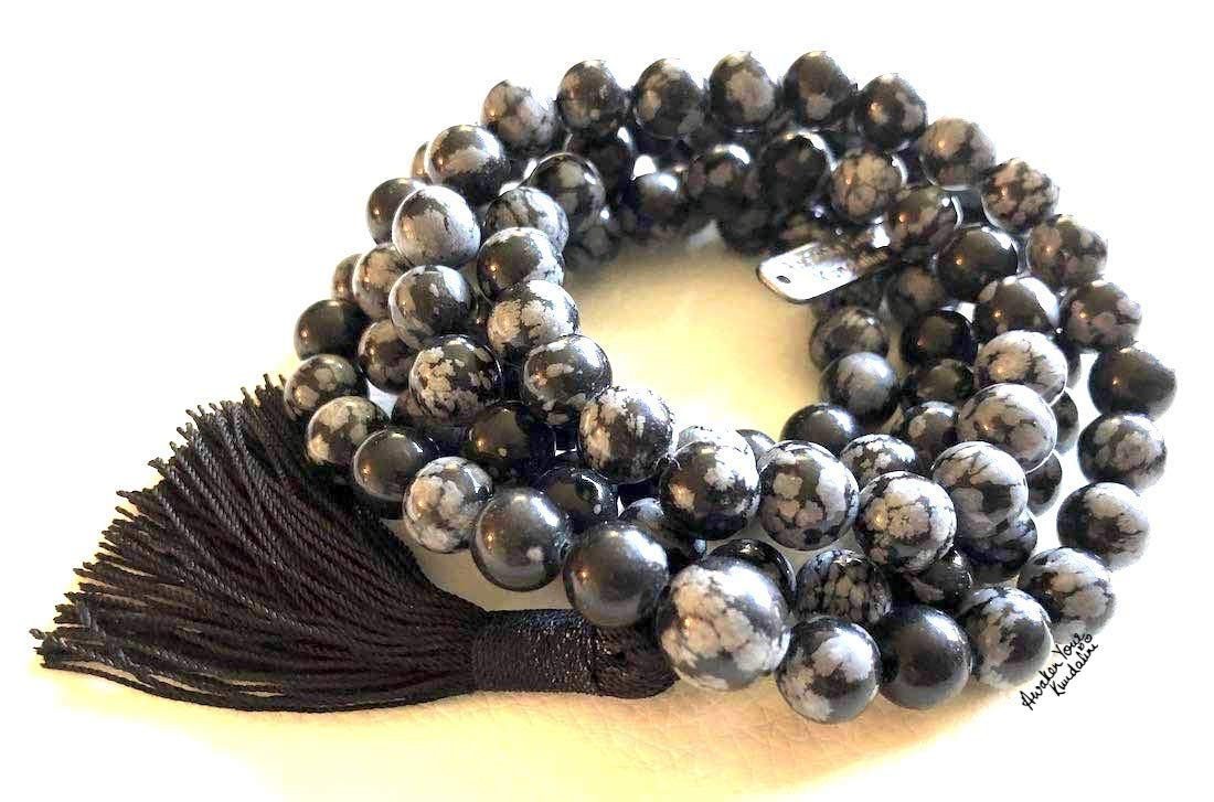 Dragon Glass Obsidian Mala Necklace featuring 108 hand-knotted obsidian beads, designed for protection and grounding, ideal for meditation or as a spiritual accessory.