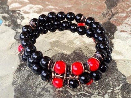  Black Onyx & Red Coral Bracelet featuring genuine Black Onyx and Red Coral beads, designed for Root and Sacral Chakra balance and ideal for Aries and Scorpio birthstones.