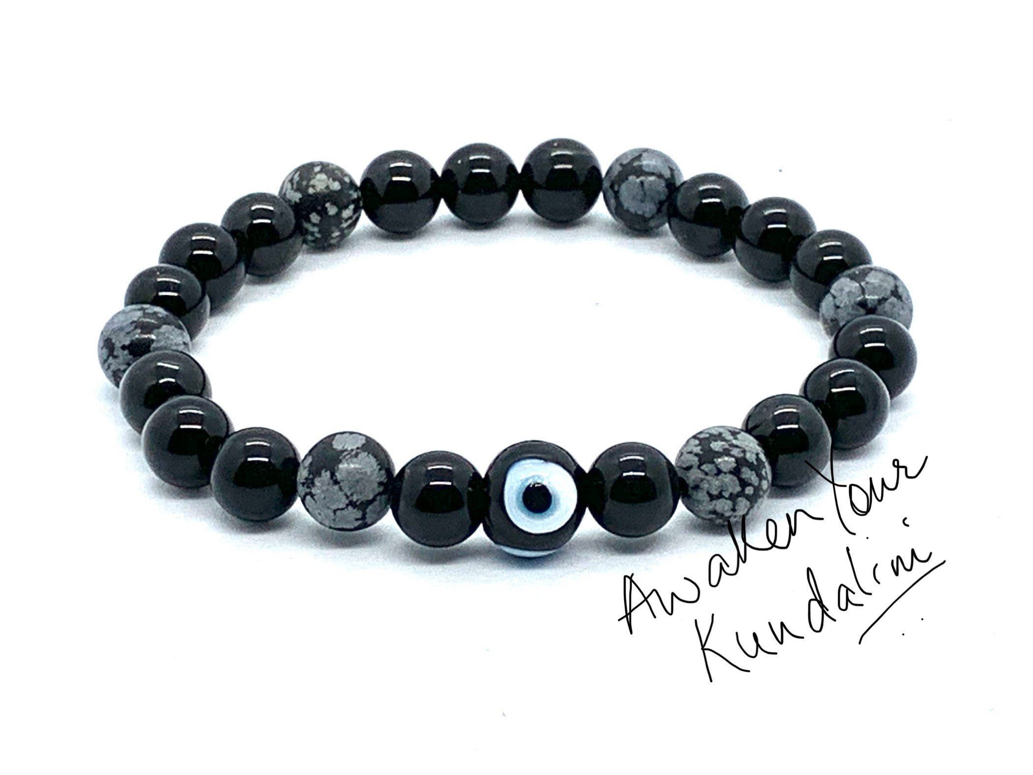 Triple Power Protection Bracelet featuring genuine Tourmaline, Obsidian, and Onyx beads, designed for Root Chakra support and Capricorn Sun Sign energy enhancement.