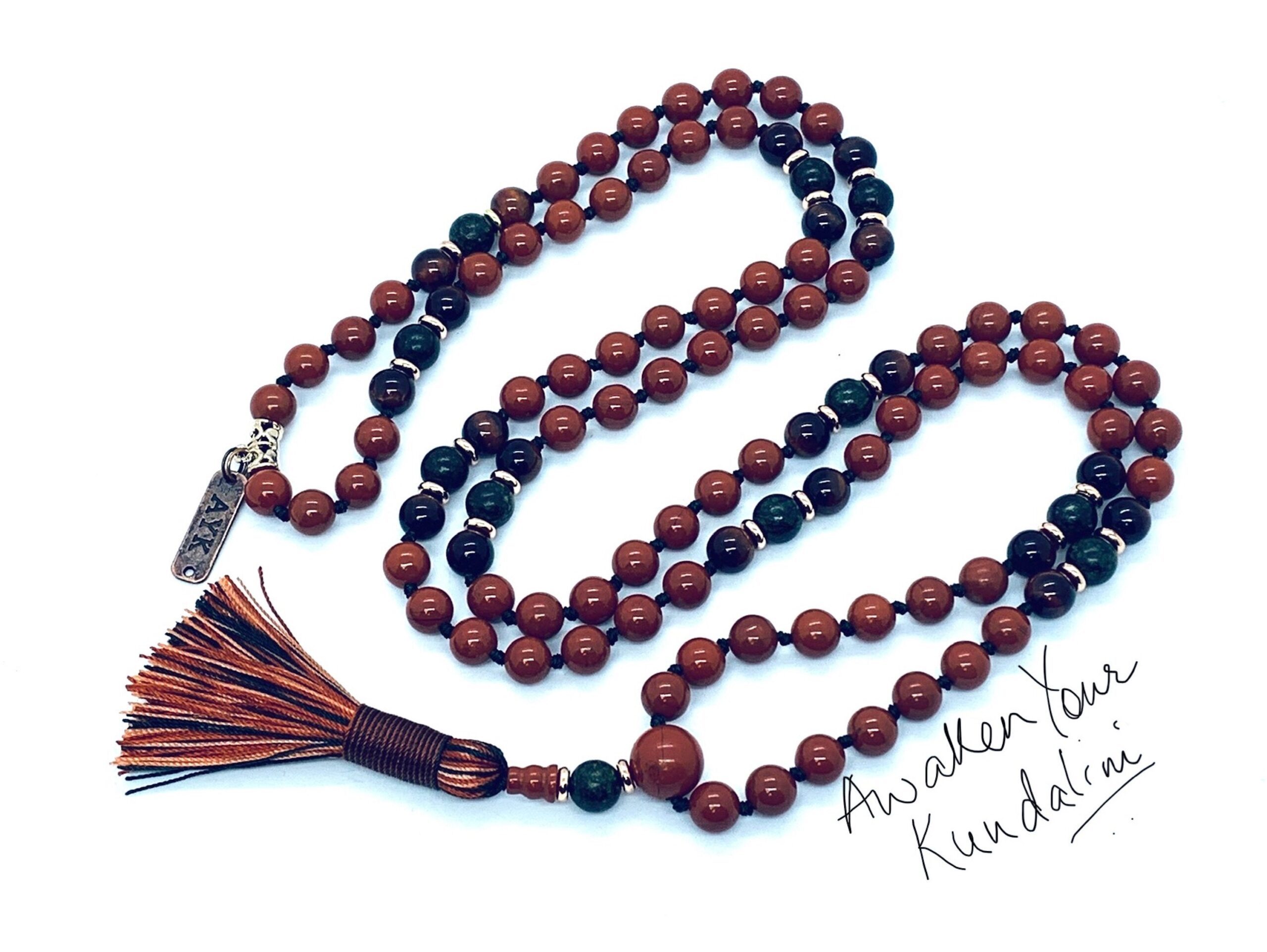 Red Jasper, Serpentine & Red Tiger's Eye Mala Necklace focusing on Root and Sacral Chakras, offering grounding and vitality. Ideal for Aries and Capricorn, with hand-knotted beads for spiritual growth.