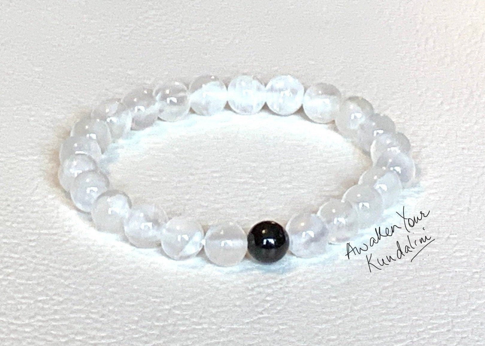 Black Tourmaline & Selenite Bracelet for Capricorn sun sign, featuring root and crown chakra grounding and protective benefits