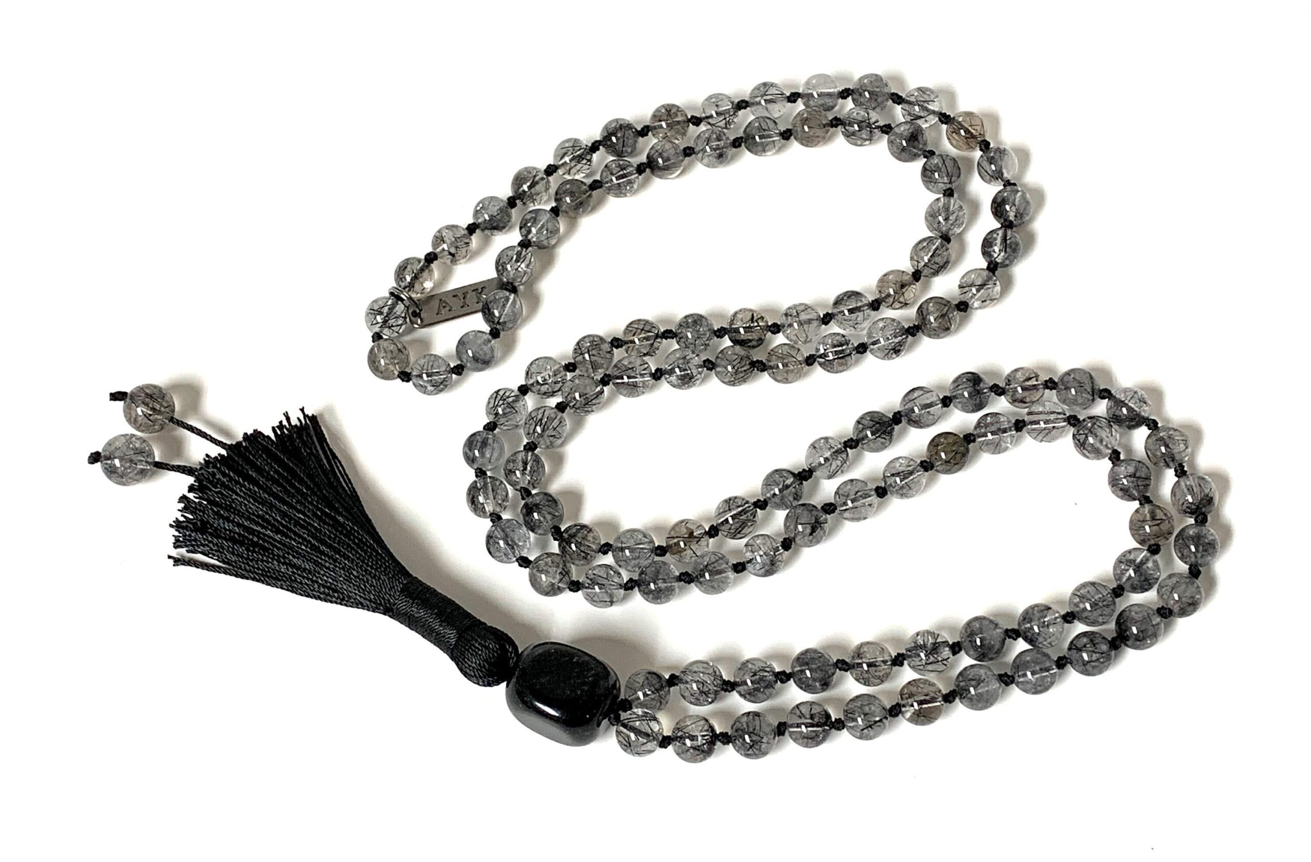 Black Rutilated Tourmilated Quartz Mala Beads Necklace crafted for Root and Crown Chakra balance, ideal for Libra and Scorpio, promoting transformation and grounding.