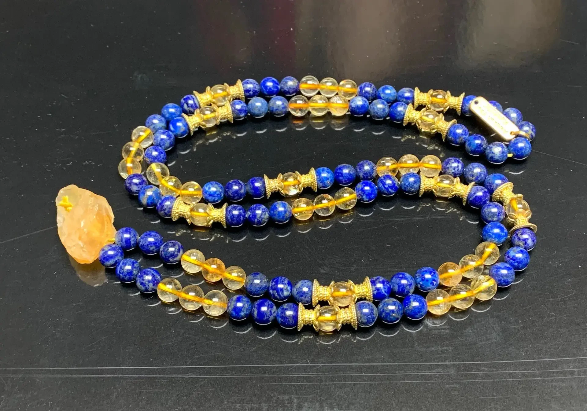 Lapis Lazuli & Citrine Mala Necklace designed for Third Eye and Solar Plexus Chakra support, resonating with Sagittarius and Leo, promoting intuition and abundance.