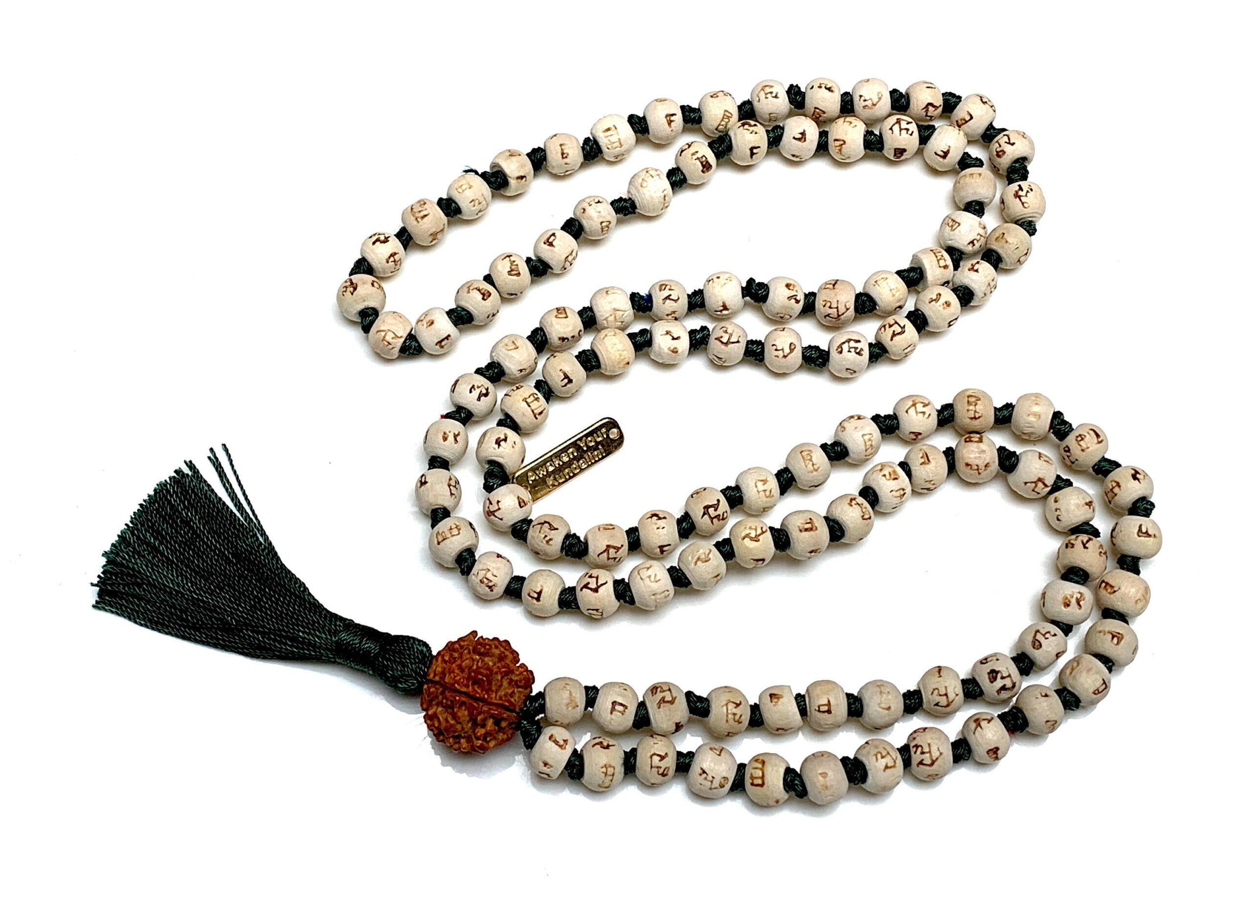 Holy Basil Hare Rama Krishna Mala Necklace featuring 108 hand-knotted Tulsi beads, designed for mantra meditation, spiritual grounding, and devotion, resonating with the Root Chakra and Capricorn zodiac sign.