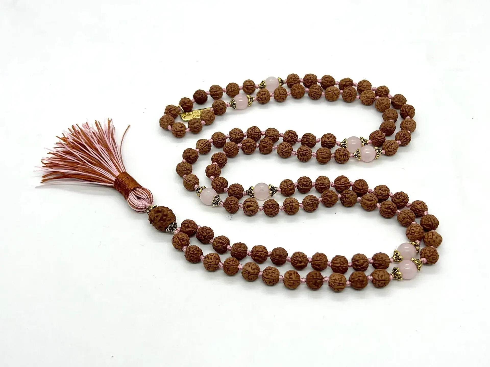 Rudraksha & Rose Quartz Kriya Mala designed for Root Chakra support, enhancing spiritual practice and grounding, with energies resonating with Capricorn.