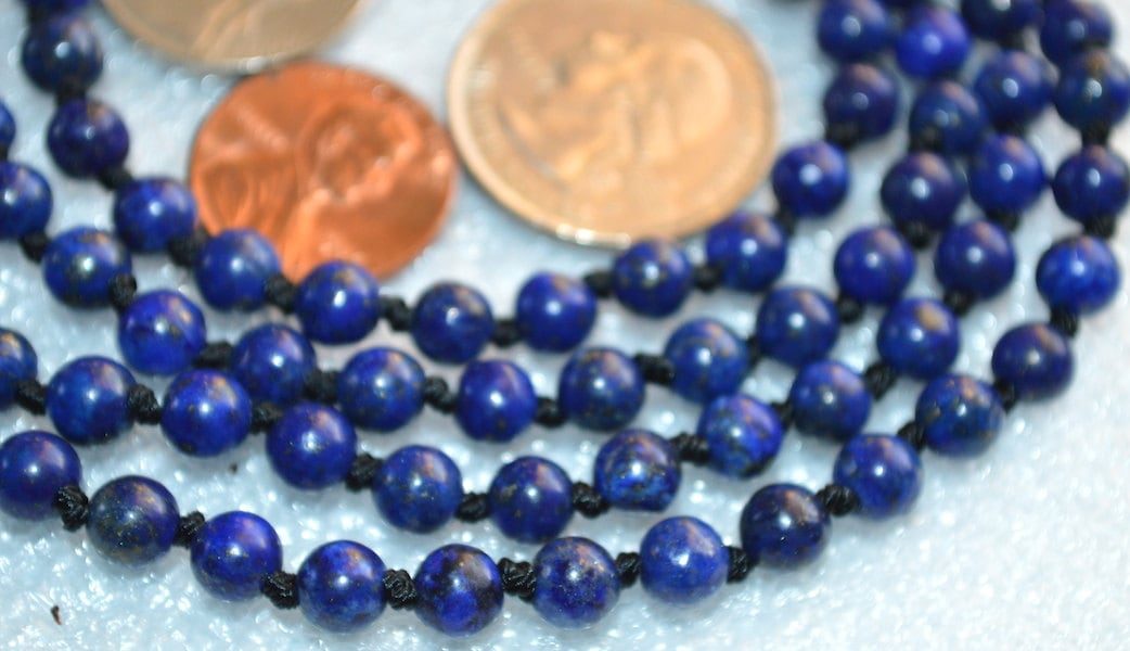 Lapis Lazuli Knotted Mala Necklace with 108 hand-knotted beads, designed to activate the Third Eye and Throat Chakras. Ideal for Sagittarius and Libra, enhancing intuition and communication. Perfect for meditation and spiritual growth.