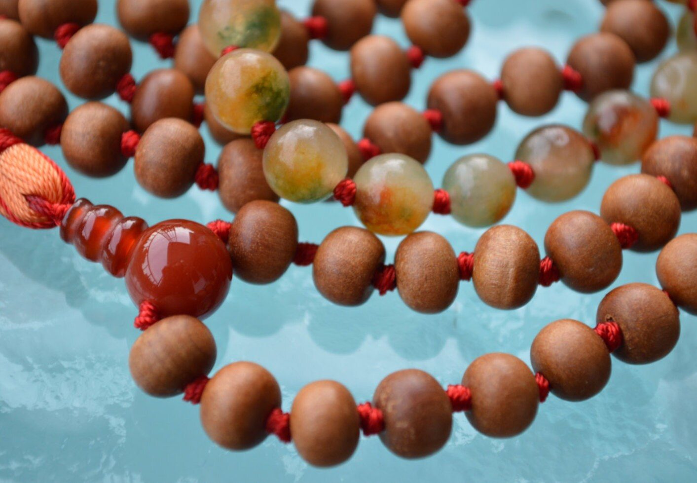 Pure Sandalwood & Jade Mala Beads Necklace designed to support the Heart Chakra, promoting harmony, emotional balance, and prosperity, resonating with Virgo and Libra energies.