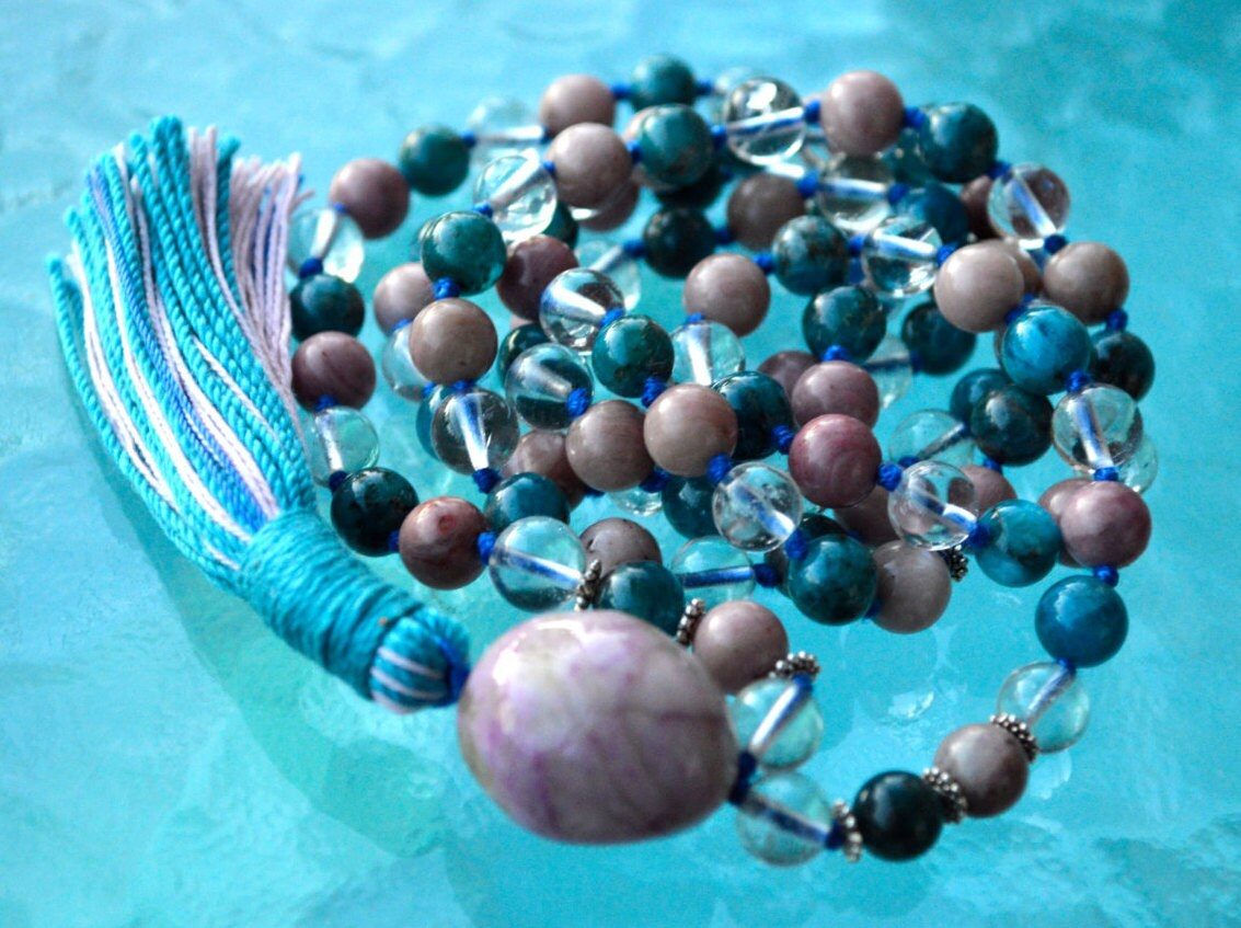 Apatite, Crystal Quartz & Rhodonite Mala Necklace for Throat and Heart Chakra balance, enhancing communication and emotional healing. Ideal for Gemini and Taurus, with hand-knotted beads.